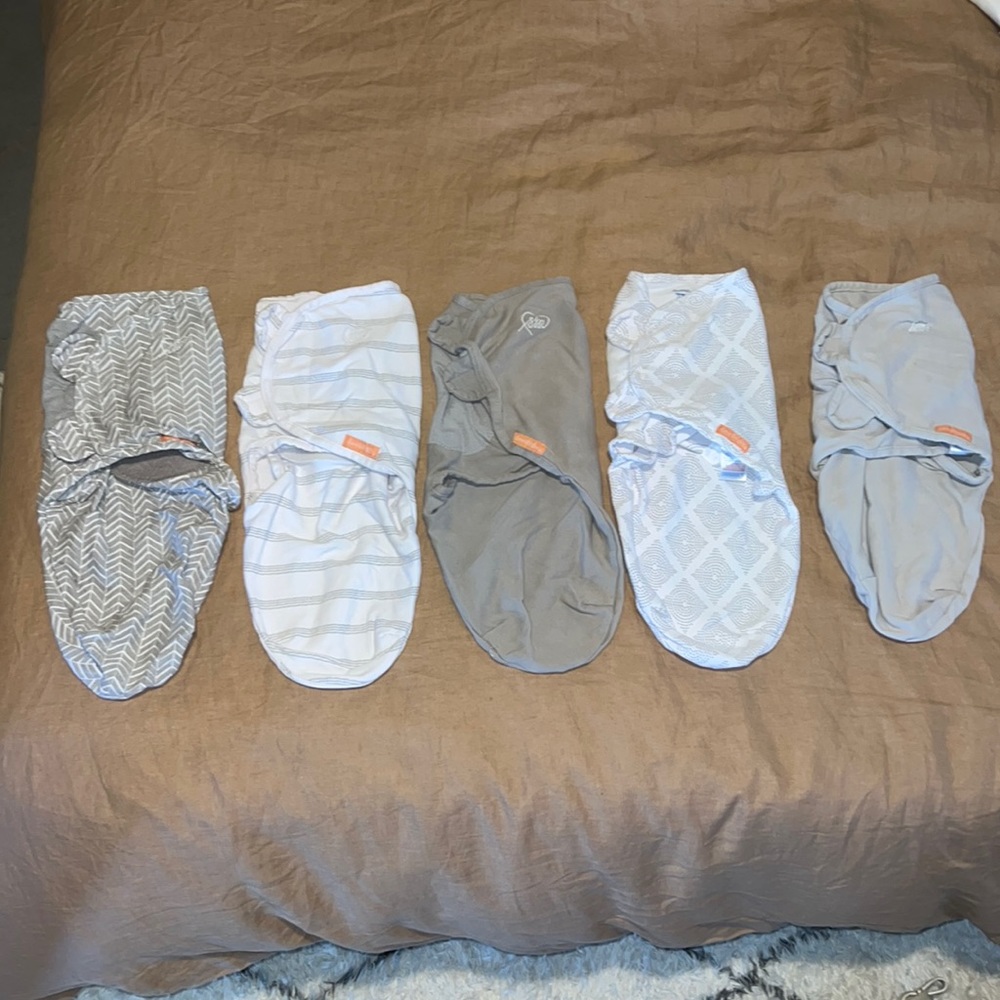 Baby swaddles - either never worn, or only worn 1 time.